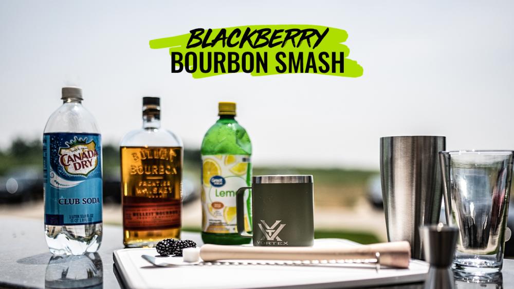 Bourbon, blackberries, seltzer, mint ingredients for a Blackberry Bourbon Smash summer drink