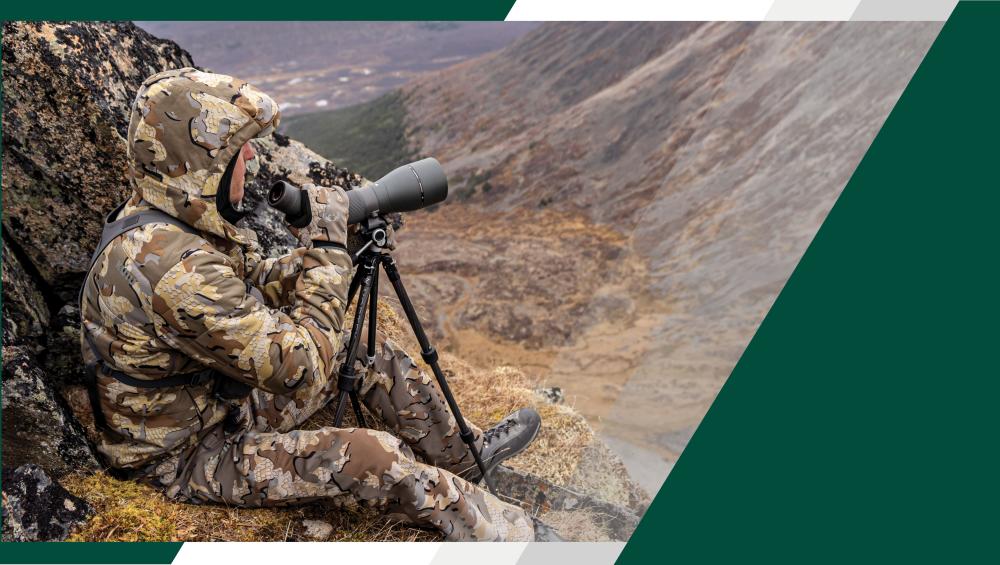 Backcountry hunter glassing with the Summit™ Carbon II tripod.