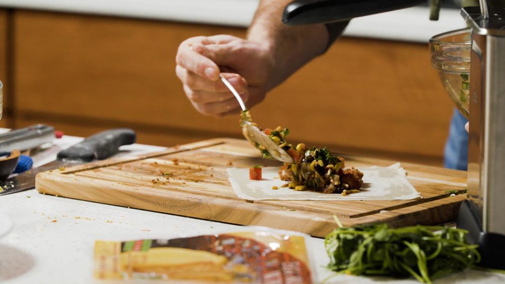 Wrapping wild turkey ingredients in an egg roll