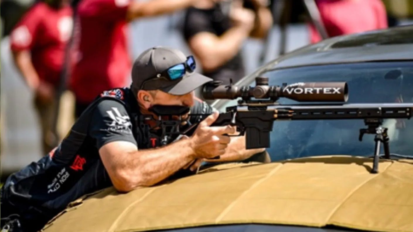 Competitive shooter Tucker Schmidt shooting.